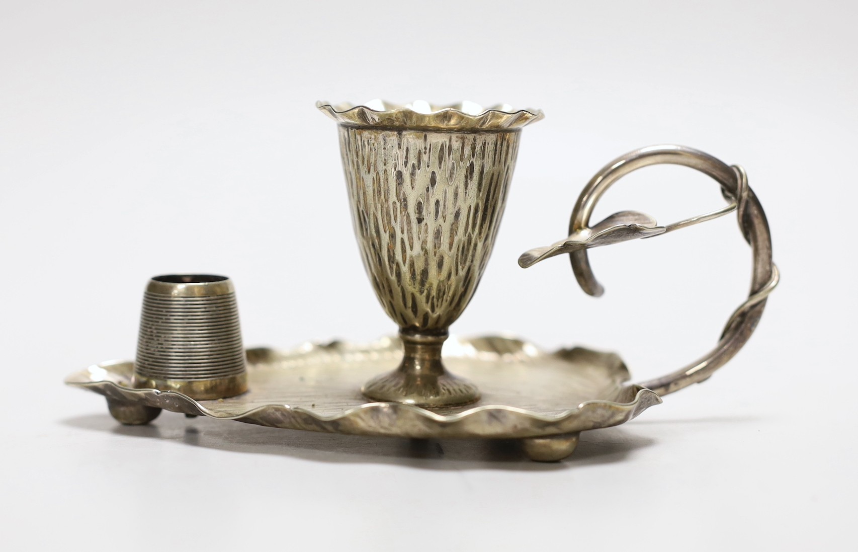 A Hukin & Heath silver plated ‘leaf’ chamber stick with matchstick striker, 17cm long